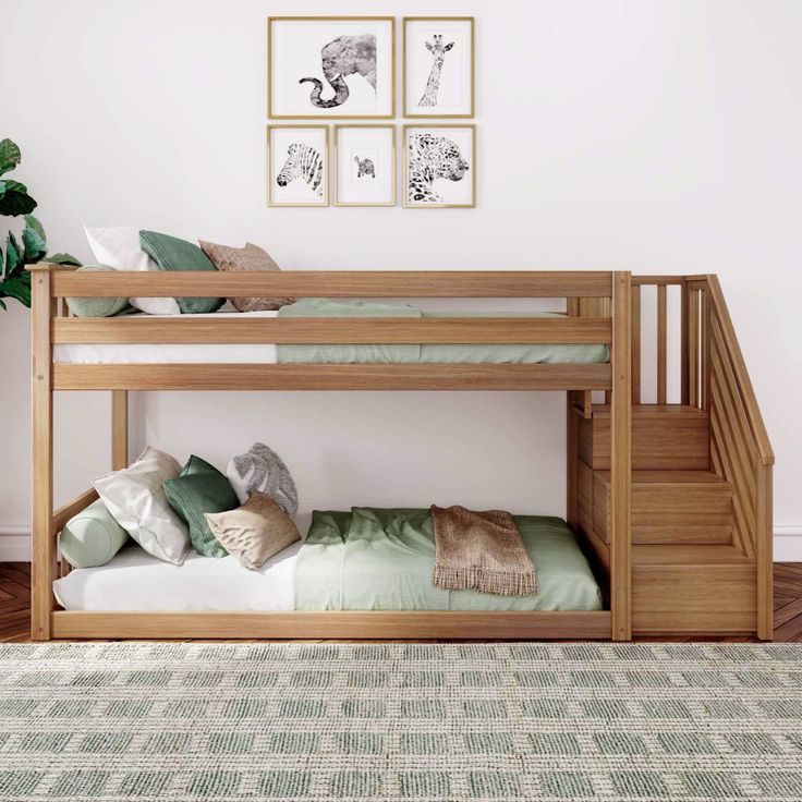 a wooden bunk bed sitting next to a green rug on top of a hard wood floor