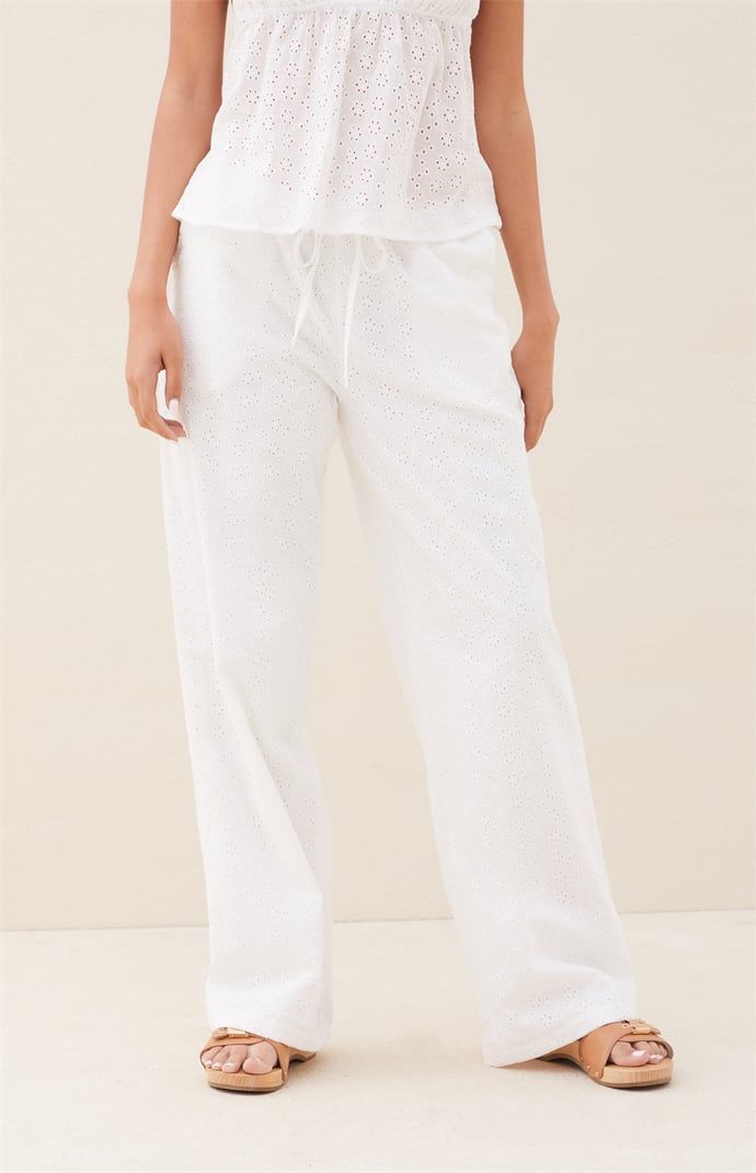 Get ready for sunny days ahead with the Beverly and Beck Eyelet Pants. These pants feature a comfortable drawstring waistline and convenient side pockets. Made from a lightweight cotton with eyelet detailing throughout, they're the perfect combination of style and comfort for the warmer weather. Whether you're strolling on the beach or enjoying a brunch with friends, these pants are a must-have


	Drawstring waistline
	Side pockets
	Lined
	Lightweight
	Floral eyelet design
	10.5" rise
	Mid- Relaxed Cotton Pants For Vacation, Summer Cotton Pants For Daywear, Vacation Cotton Pants With Elastic Waistband, Cotton Pants With Elastic Waistband For Vacation, Cotton Drawstring Pants For Vacation, Beach Cotton Pants With Drawstring, Cotton Drawstring Bottoms For Vacation, Cotton Pants For Spring Vacation, Spring Vacation Cotton Pants