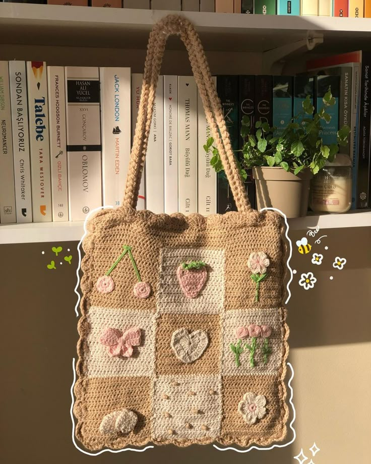 a handbag hanging on a book shelf next to some books