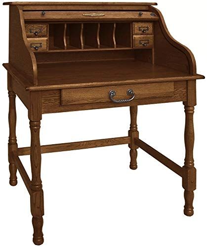 an old fashioned wooden desk with drawers