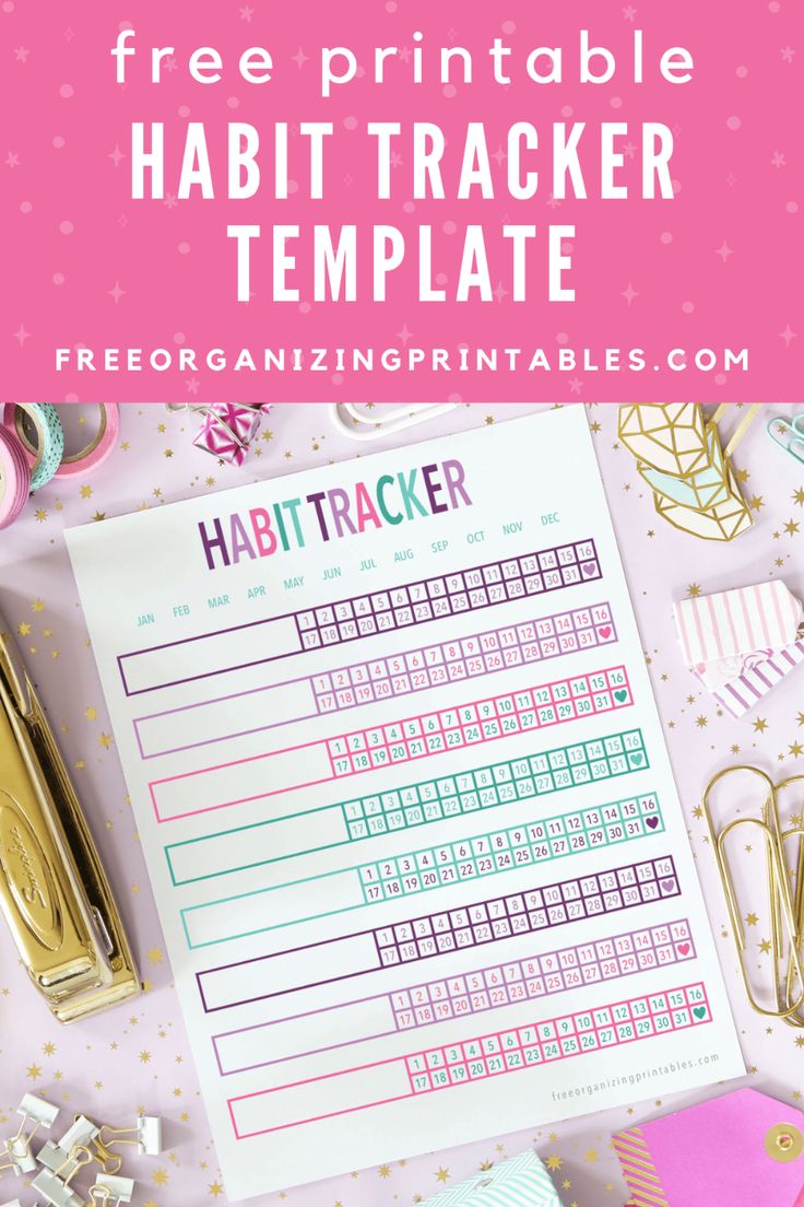 a free printable habit tracker is shown on a table with gold and pink accessories