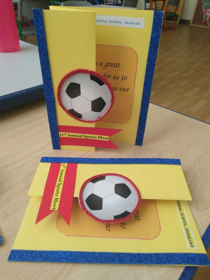 two greeting cards with a soccer ball inside