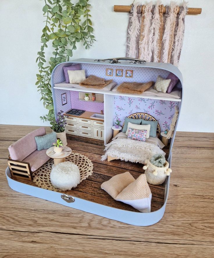 a doll house with furniture and accessories in it