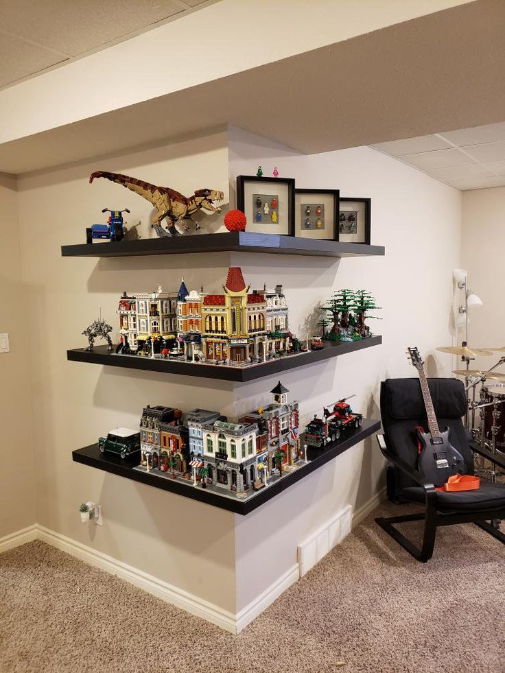 two shelves filled with legos on top of each other