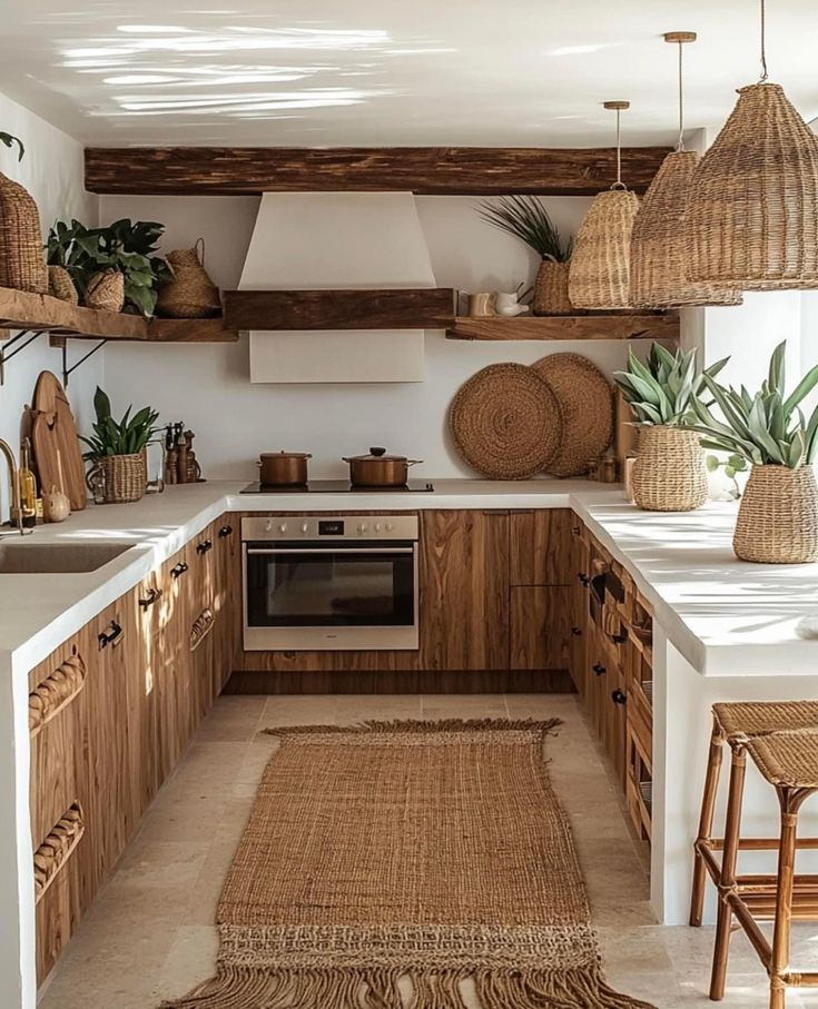 a kitchen with wooden cabinets and wicker baskets hanging from the ceiling, along with an area rug on the floor