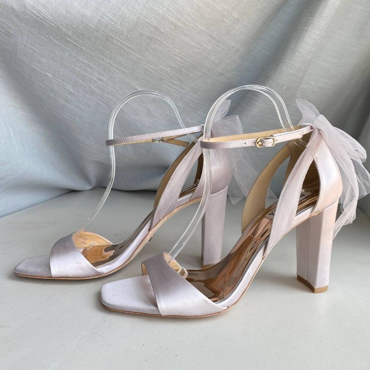 Badgley Mischka Kim Mesh Bow Ankle Strap Block Heel Color: Soft Lavender Purple Women's Size 9 New In Partial Box - Missing Lid "For The Blushing Bride With A Fierce Nature. Stride Towards Your Happily Ever After In Shoes That Empower You With Height And Highlight Your Femininity. Kim Elevates You With Confidence, And A 3 ½ Inch Block Heel. The Tulle Bow At The Back Is Reminiscent Of A Bridal Veil, Bringing Blissful Beauty To Your Look." Specifications Mp6231 Heel Height: 3.54” (90mm) Block Heel Elegant Lavender Heels For Party, Elegant Lavender Ankle Strap Heels, Elegant Lavender Heels For Formal Occasions, Bejeweled Shoes, Lavender Shoes, Black Evening Shoes, White Heels Wedding, Silver Strappy Sandals, Coquette Kawaii