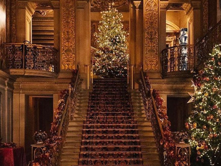 a christmas tree sitting on top of a set of stairs