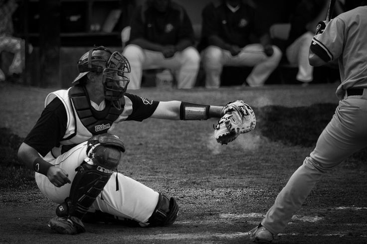 a catcher and umpire during a baseball game