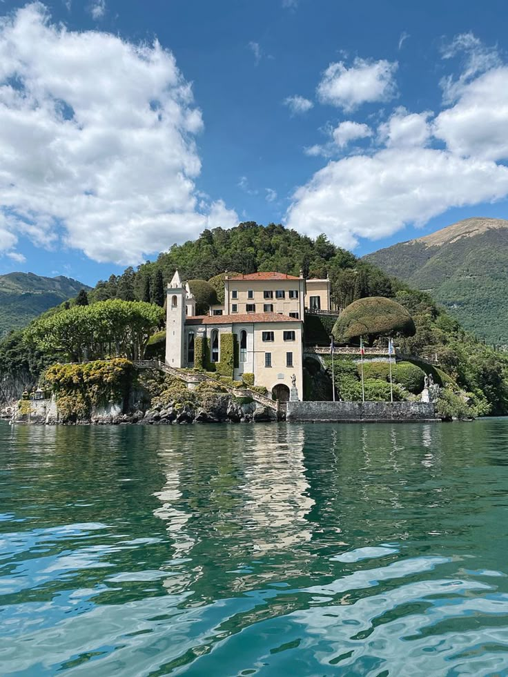 a house on an island in the middle of water