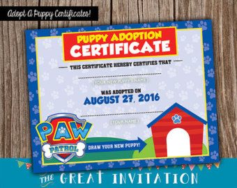 a puppy certificate is shown on a wooden surface