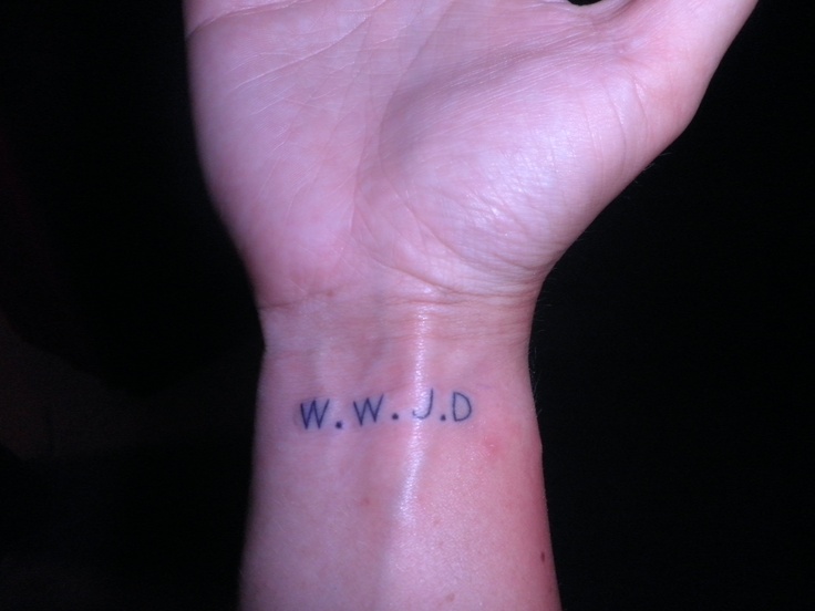 a person's wrist with the word w d tattooed on it