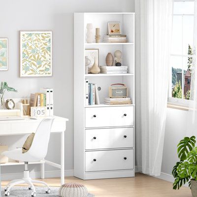 a white desk and chair in a room