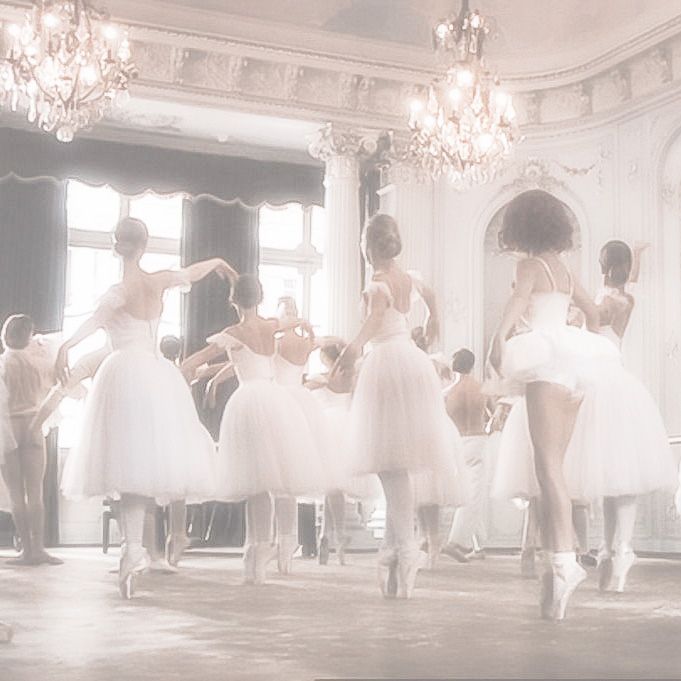 several ballerinas in white tutu skirts are dancing