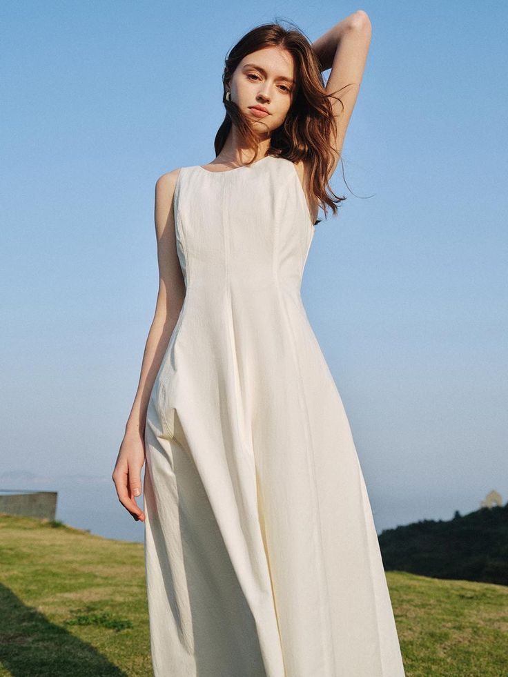 This is We’Dee’s maxi dress exudes femininity with its clean and simple design, making it perfect for hot summer days with its cool fabric.- Perfect for daily wear- Can be paired with different styles of accessorize to create various looks- The clean design makes it easy to style with any outfit White H-line Spring Dress, Sleeveless H-line Dress For Spring, Elegant H-line Sleeveless Summer Dress, Minimalist Sleeveless Midi Dress For Spring, Chic Sleeveless H-line Summer Dress, Minimalist Sleeveless Daywear Dress, White A-line Maxi Dress For Summer, Minimalist Fitted Summer Dresses, Fitted Minimalist Summer Dresses