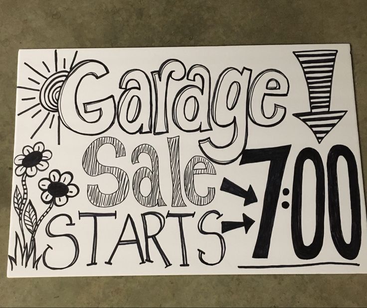 a sticker with the words garage sale starts on it