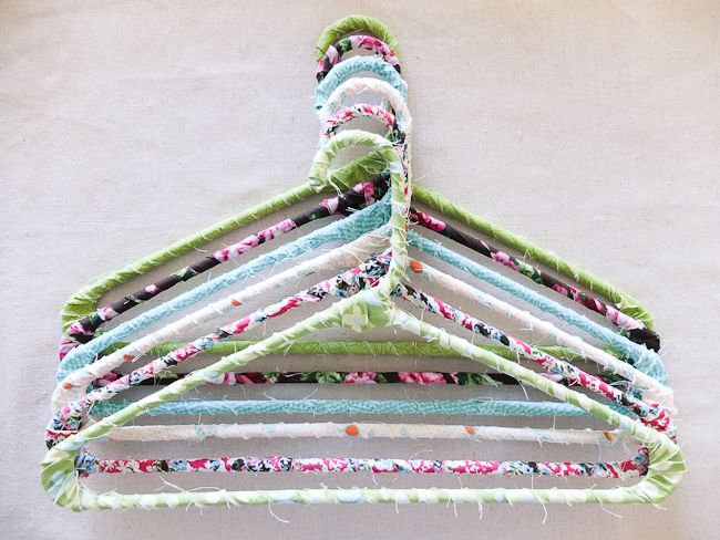 a multicolored piece of fabric hanging from a clothes hanger