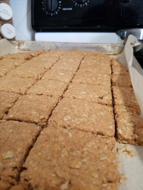 a close up of food near an oven