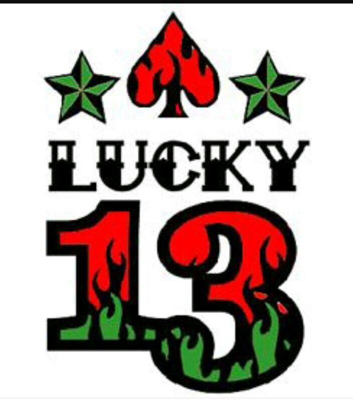 lucky 13 casino logo with five stars on the bottom and four green stars above it