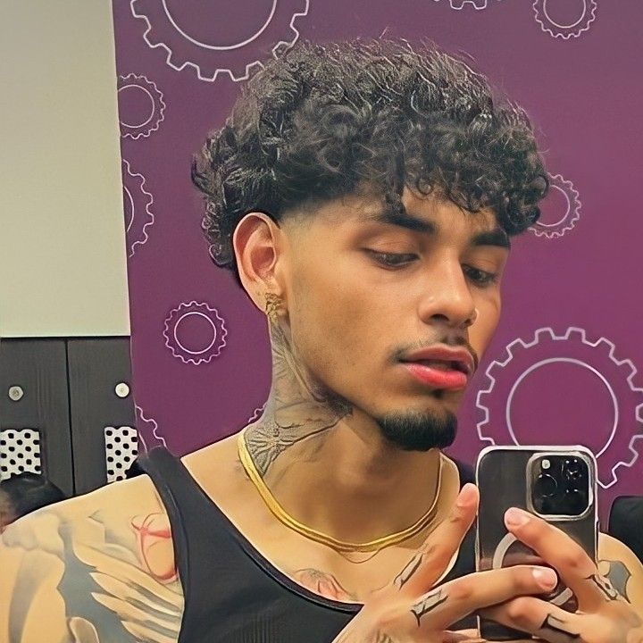 Mixed Mens Haircut Curly Hair, Skin Fade Curly Hair Men, Curly Hair Taper Men, Curly Hair Men Fade Haircut Styles, Long Curly Hair Haircuts Men, Perm With Taper Fade, Temper Fade Haircut, Thick Curly Hairstyles Men, Low Taper Fade Mullet Curly Hair