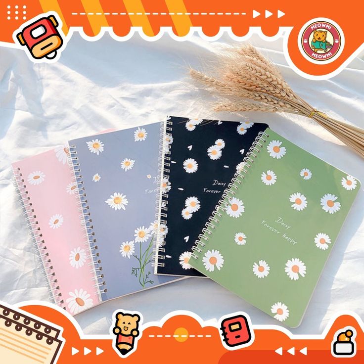 three notebooks with flowers on them sitting next to a plant and an orange background