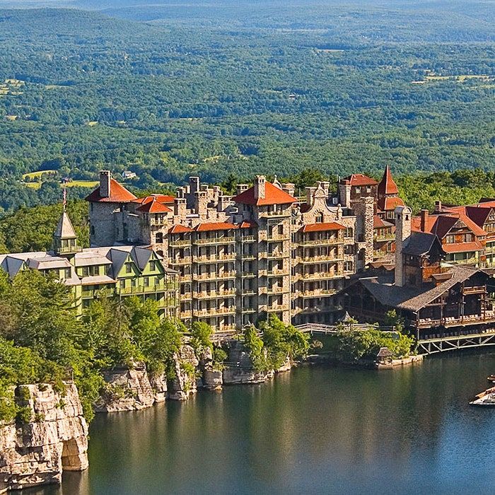 an aerial view of the resort and lake