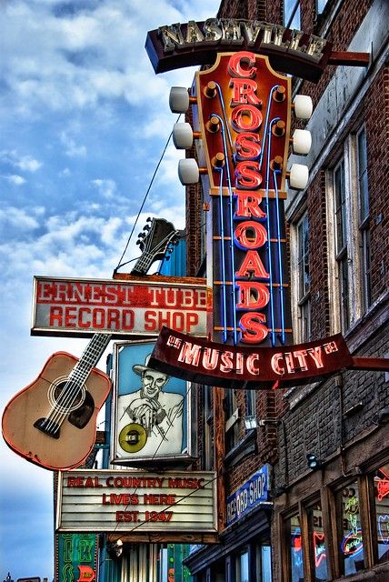 the neon sign for an old music city