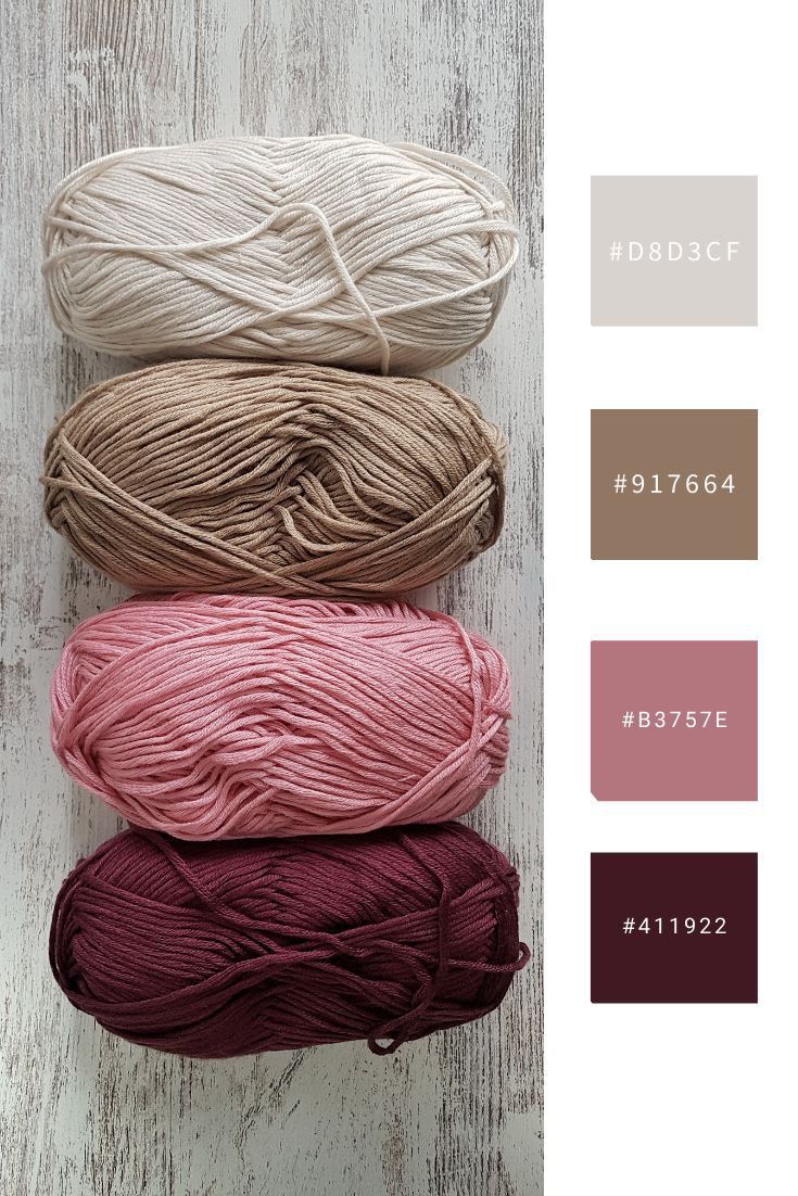 three skeins of yarn in different colors