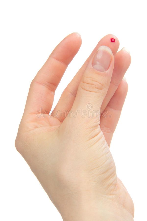 a woman's hand with pink nail polish on it