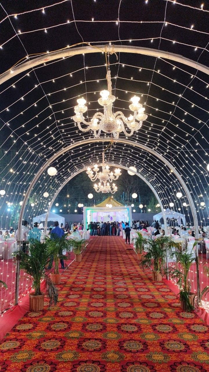 an elaborately decorated banquet hall with chandeliers and tables set up for a formal function