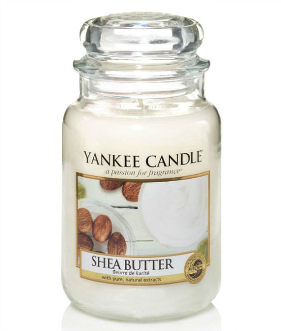 yankee candle with white frosting and almonds