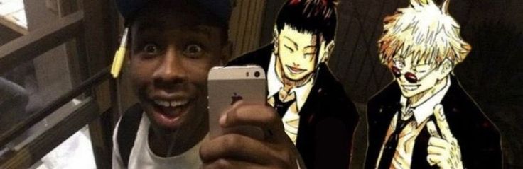 a man taking a selfie with his cell phone in front of him and two anime characters behind him