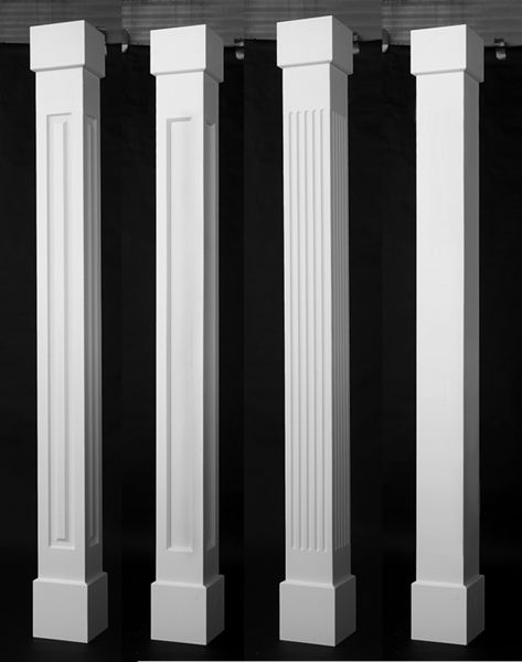 four white pillars are lined up against a black background