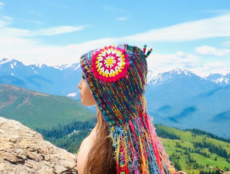 Crazy Knit Hat Bohemian Hat Hippie Knit Hat Funky Hat Fringe Knit Hat.  One of a kind winter hat.  This hat will fit all head sizes. It is our promise that you will not find this hat anywhere else.  Make a Bold Statement with this crazy knit hat handcrafted with lots of craziness and love.  Hand knitted with rainbow mixed color acrylic yarn and embellished with a beautiful granny square crochet applique. Care instruction: Hand wash or machine wash in gentle cycle.  Air dry only. Fast shipping. Your order will be shipped within 24 hours. Thanks. Bohemian Hat, Bohemian Hats, Funky Hats, Color Acrylic, Love Hand, Unique Hats, Long Fringe, Long Fringes, Square Crochet