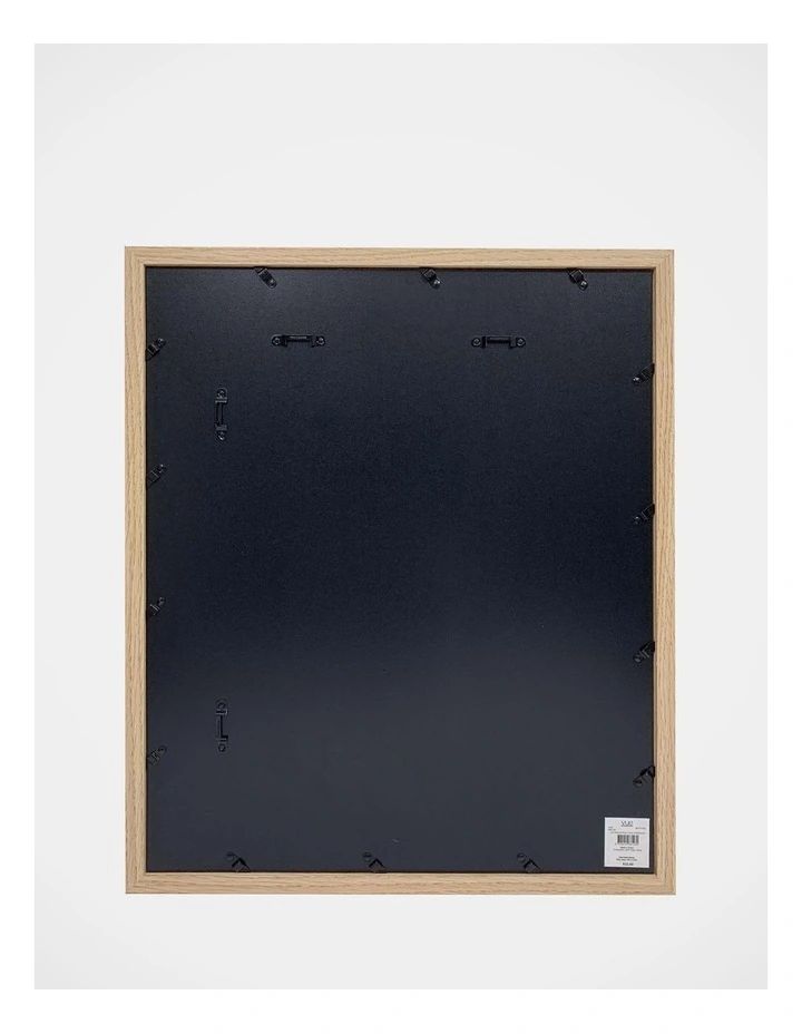 an empty wooden frame on the wall with screws and holes in it for display