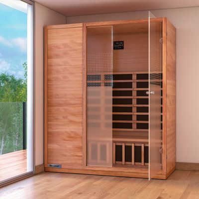 an empty room with a sauna in it