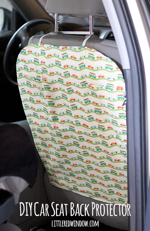 a car seat back protector with cars on it