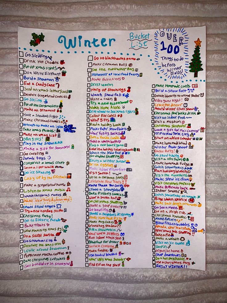 a bulletin board with the words winter written on it and christmas decorations in blue, green, yellow and red