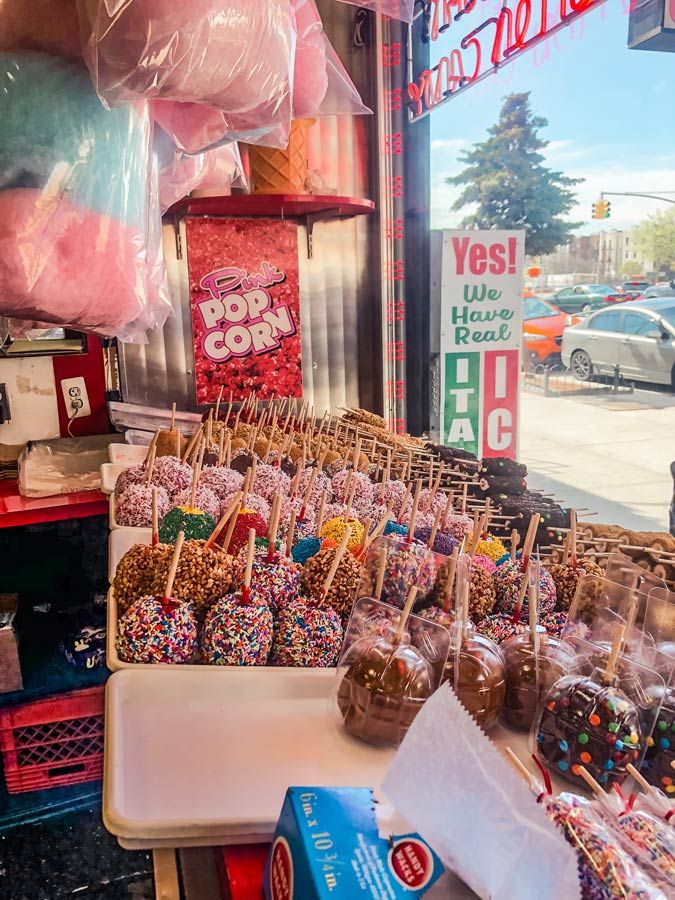 candy and candies for sale in front of a store