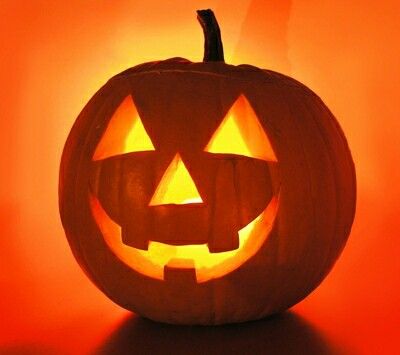 a carved pumpkin sitting on top of a table