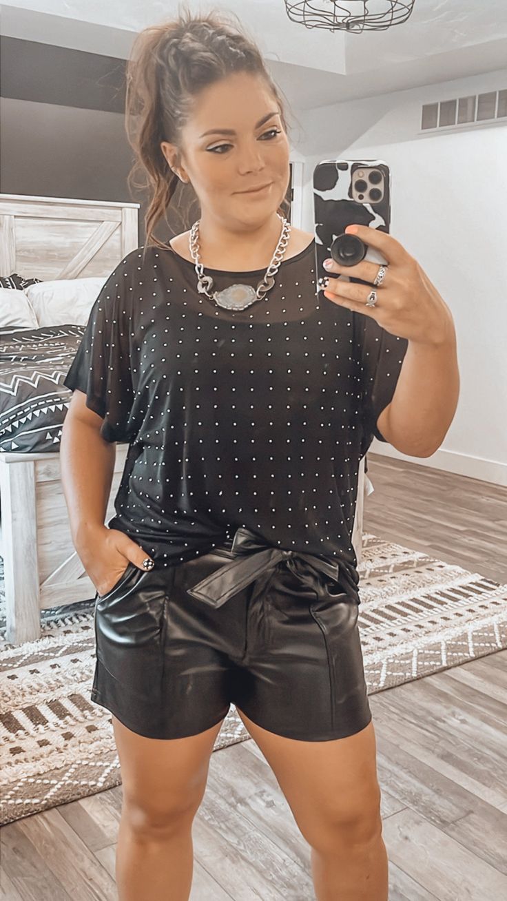 Meant for an oversized fit (even with going down a size) Light weight sheer material Sewn on rhinestones 96% polyester 4% spandex Winter Shorts Outfits, Post Malone Concert, Leather Shorts Outfit, New York Minute, Black Leather Shorts, Faux Leather Shorts, Vegas Outfit, Leather Tie, Concert Outfits