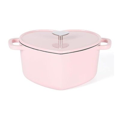 a pink casserole dish with a glass lid