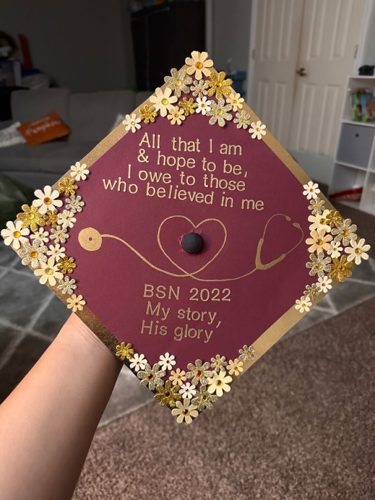 a graduation cap with flowers on it that says, all that i am & hope to be who i've delivered in me