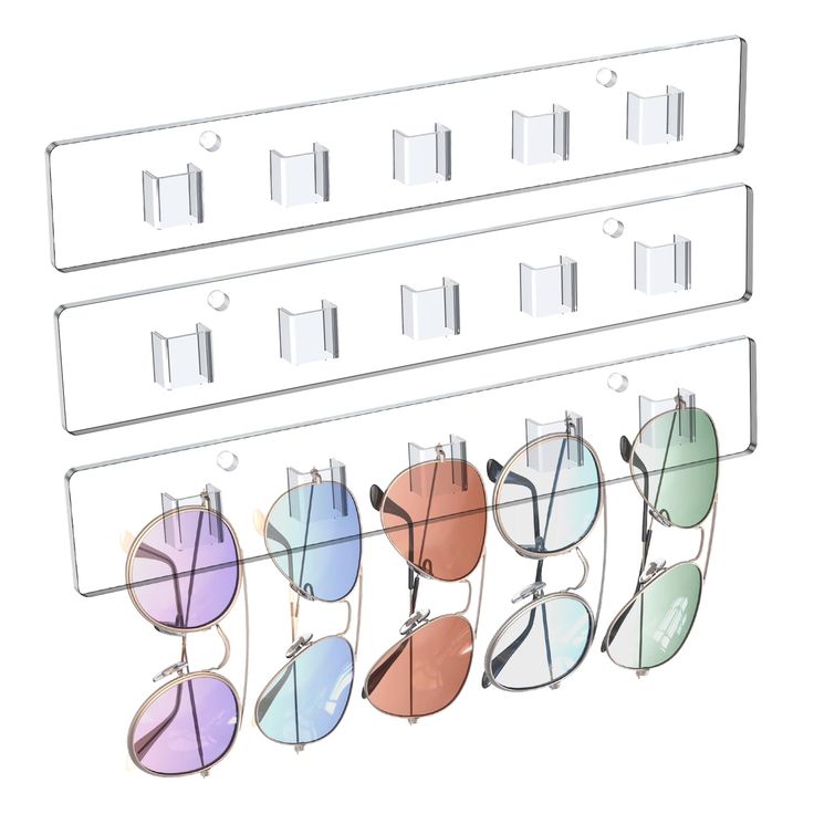 six pairs of sunglasses hanging on the wall with clips to hang them in front of each other