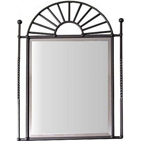 a mirror that is sitting on top of a shelf with an iron frame around it