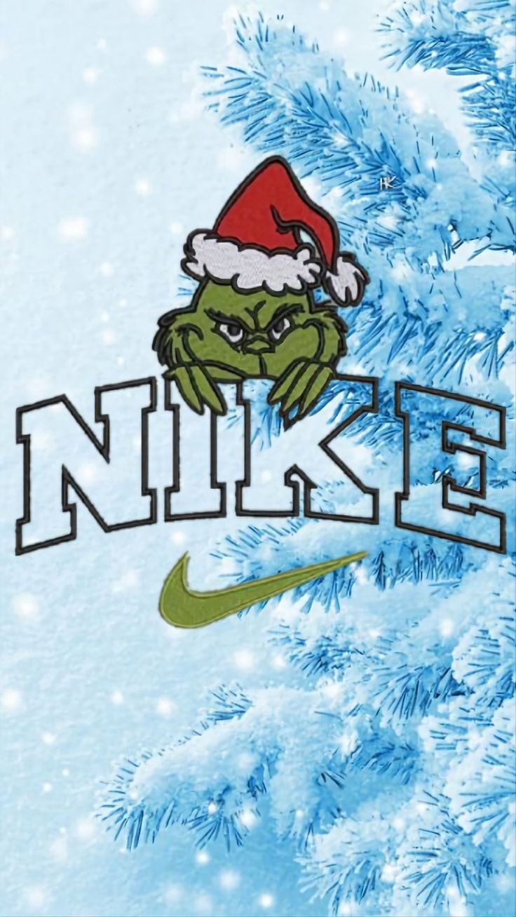 an image of the grin face on top of a christmas tree with nike written in it