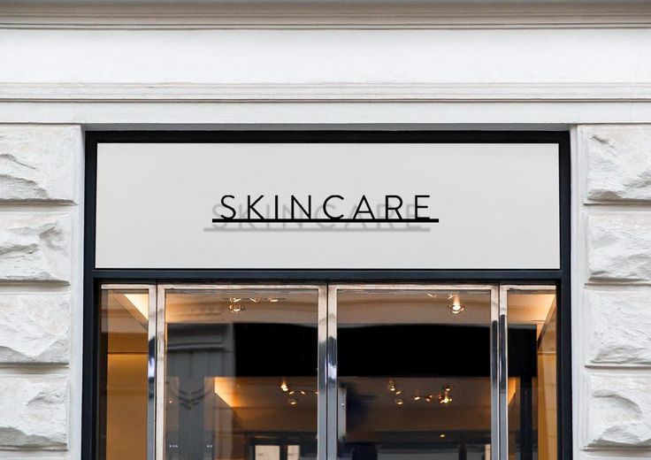 a store front with the words skin care on it's side window and sign