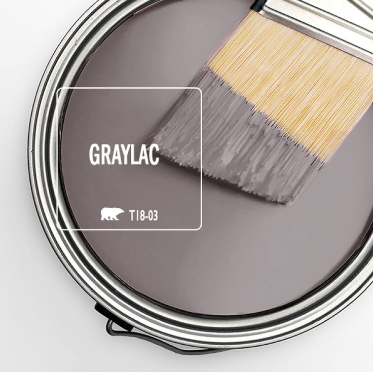 a paint can with the words off the grid on it and an image of a brush