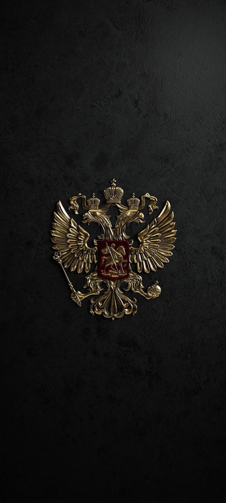 a gold and red emblem on a black background