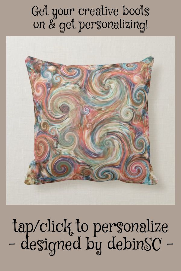 a pillow that has been designed to look like swirls on the front and back