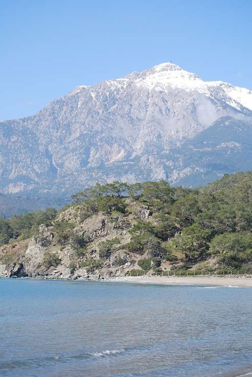 the mountains are covered with snow in the distance, and there is no image on this page to describe